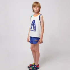 A Day At The Beach Swim Trunks by Bobo Choses