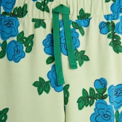 Blue Roses AOP Trousers in Green by Mini Rodini
