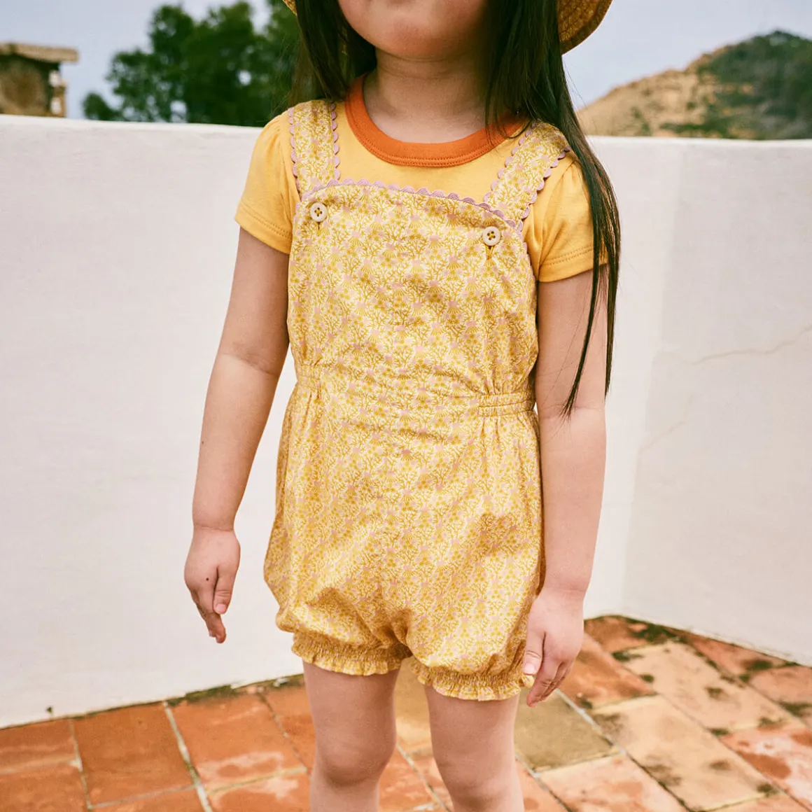 Bobbi Romper in Golden Ochre Radish Root by Misha & Puff