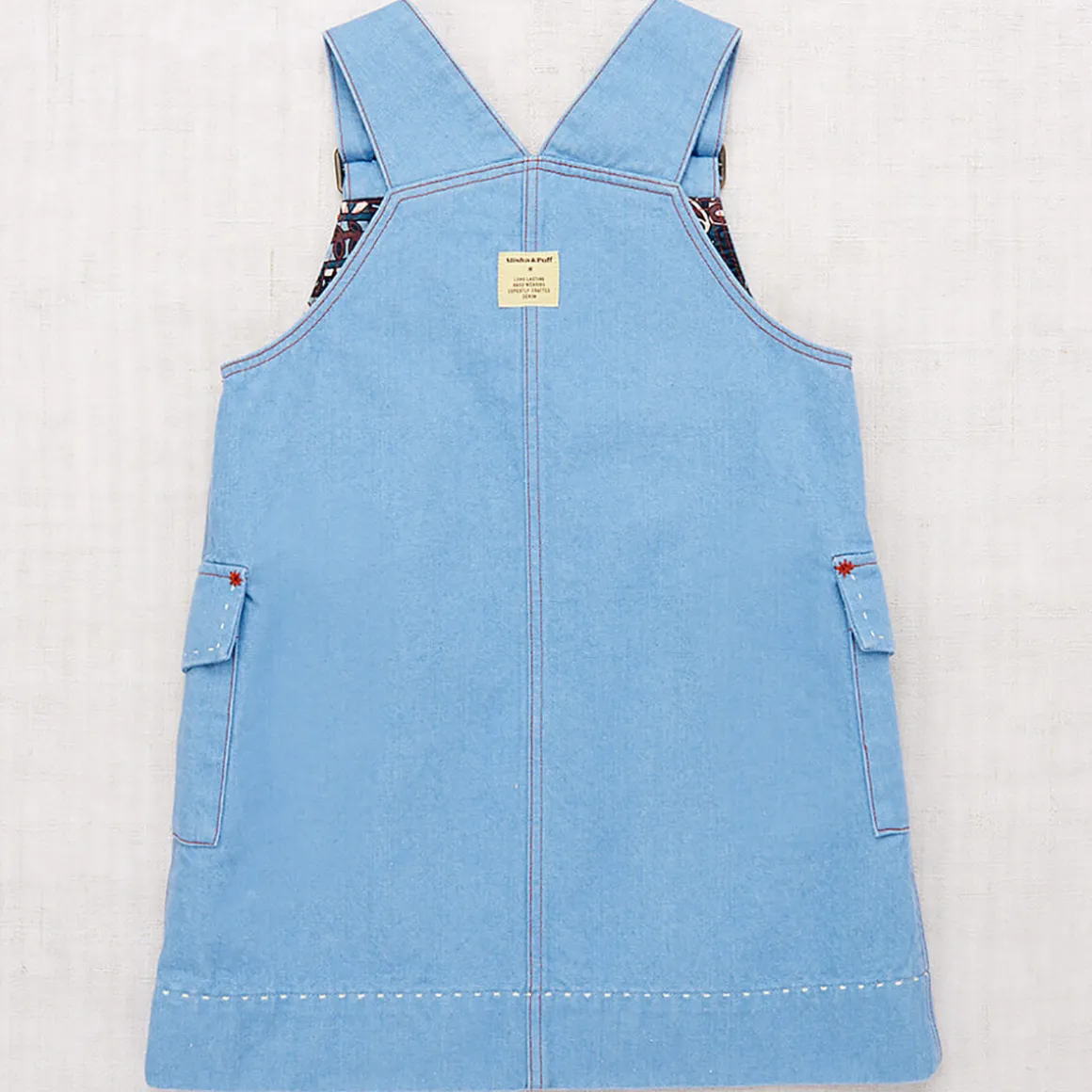 Buckle Jumper Dress in Baby Blue by Misha & Puff