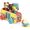 Coach Pull Toy by Vilac