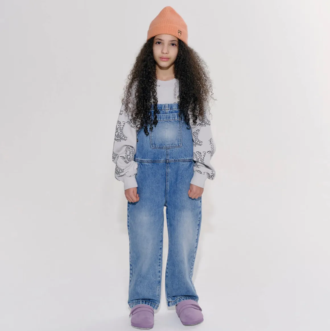 Dungaree in Faded Blue Denim by Main Story