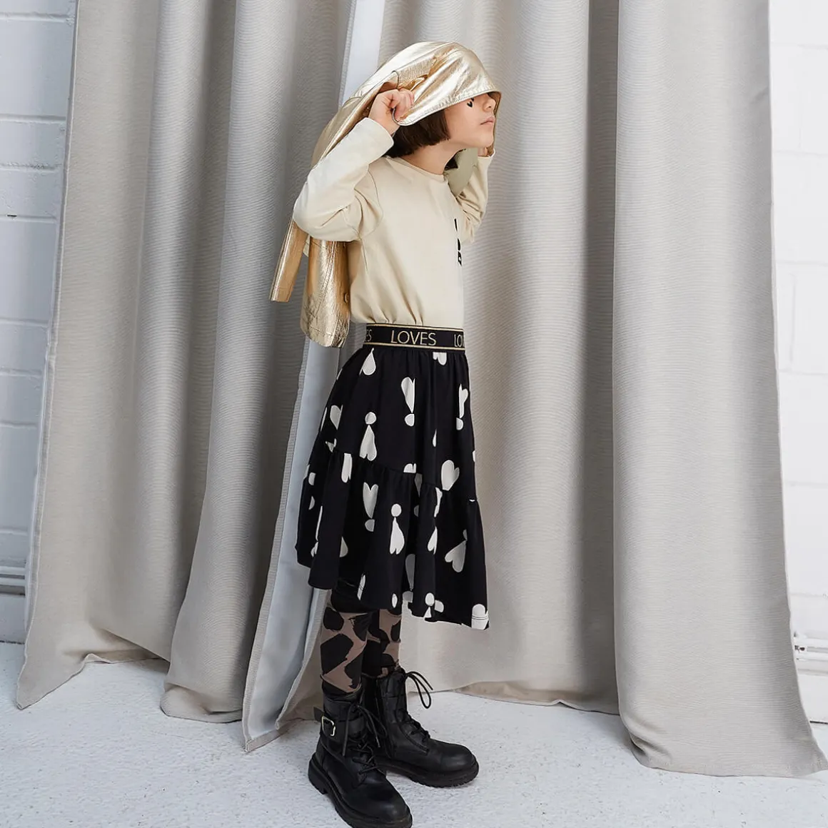 Exclamation Hearts Asymmetric Skirt in Black by Beau Loves