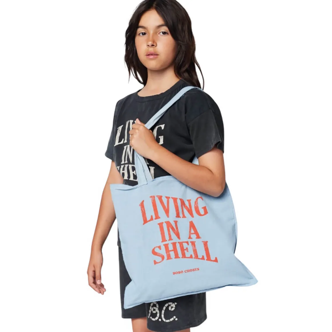 Living In A Shell Tote Bag in Blue by Bobo Choses