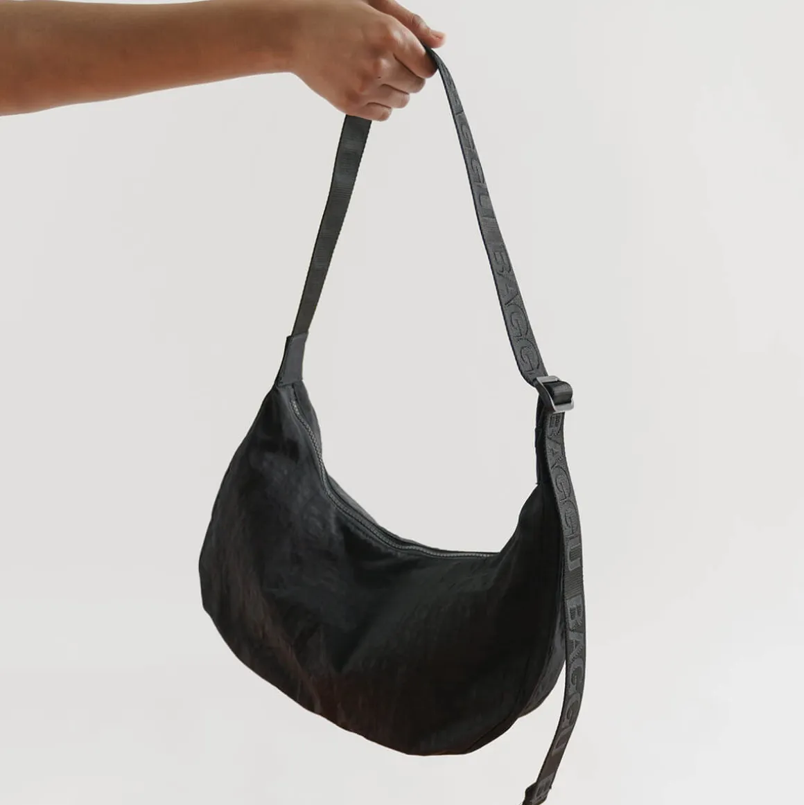 Medium Nylon Crescent Bag in Black by Baggu