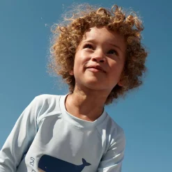 Noah Swim Tee in It Comes In Waves / Pure Sky by Liewood