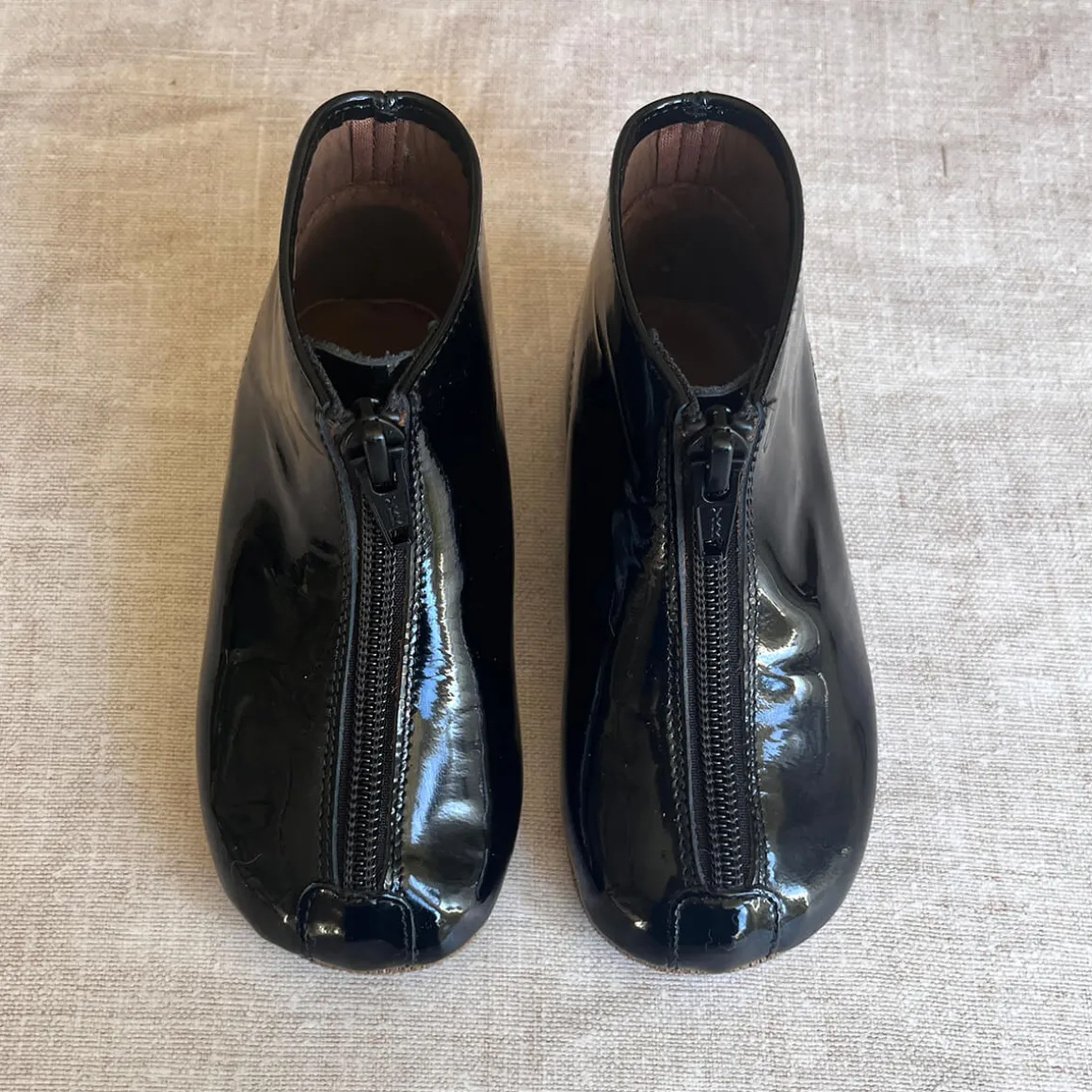 Patent Leather Booties in Black by PèPè