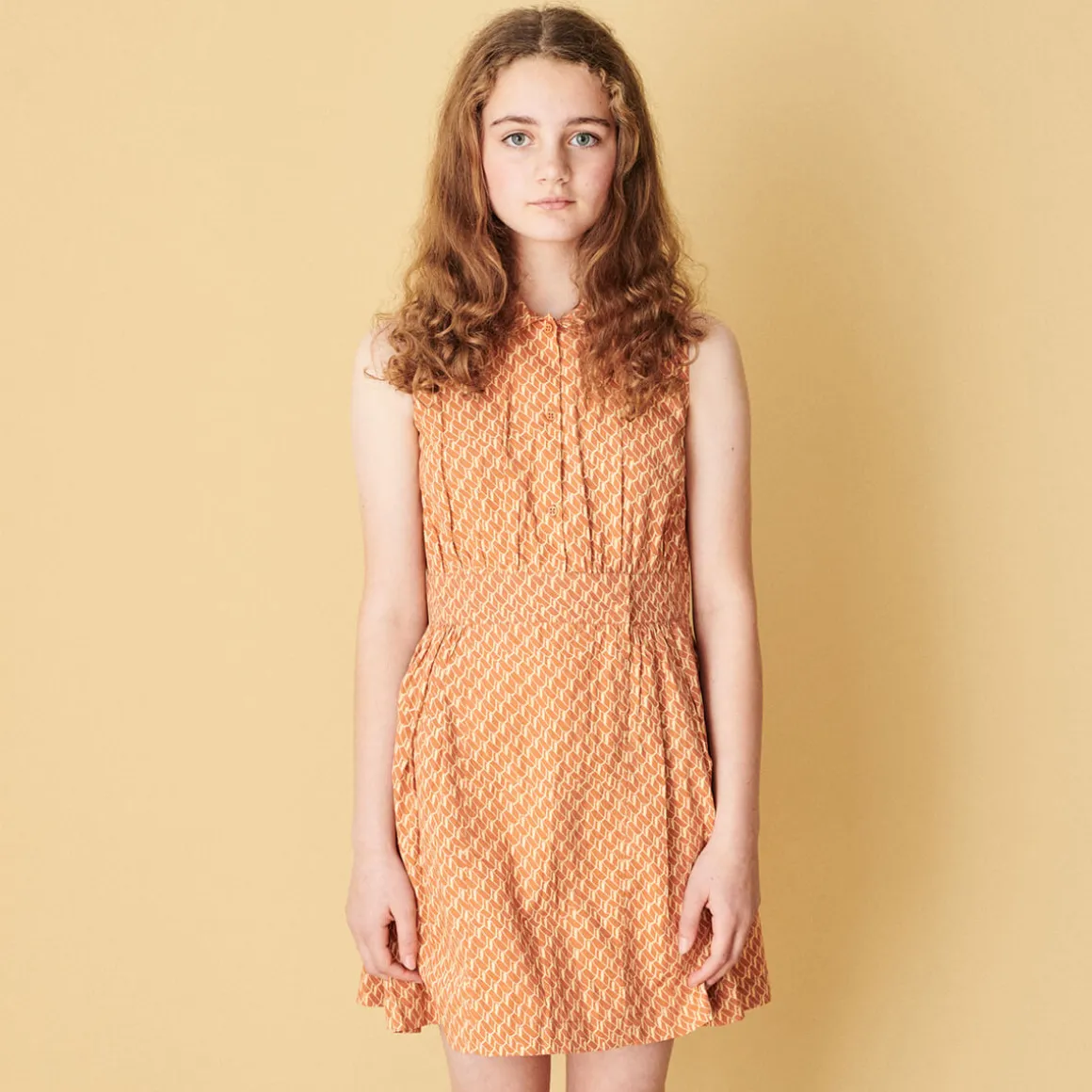 Penguin Dress in Apricot Geo Print by Caramel