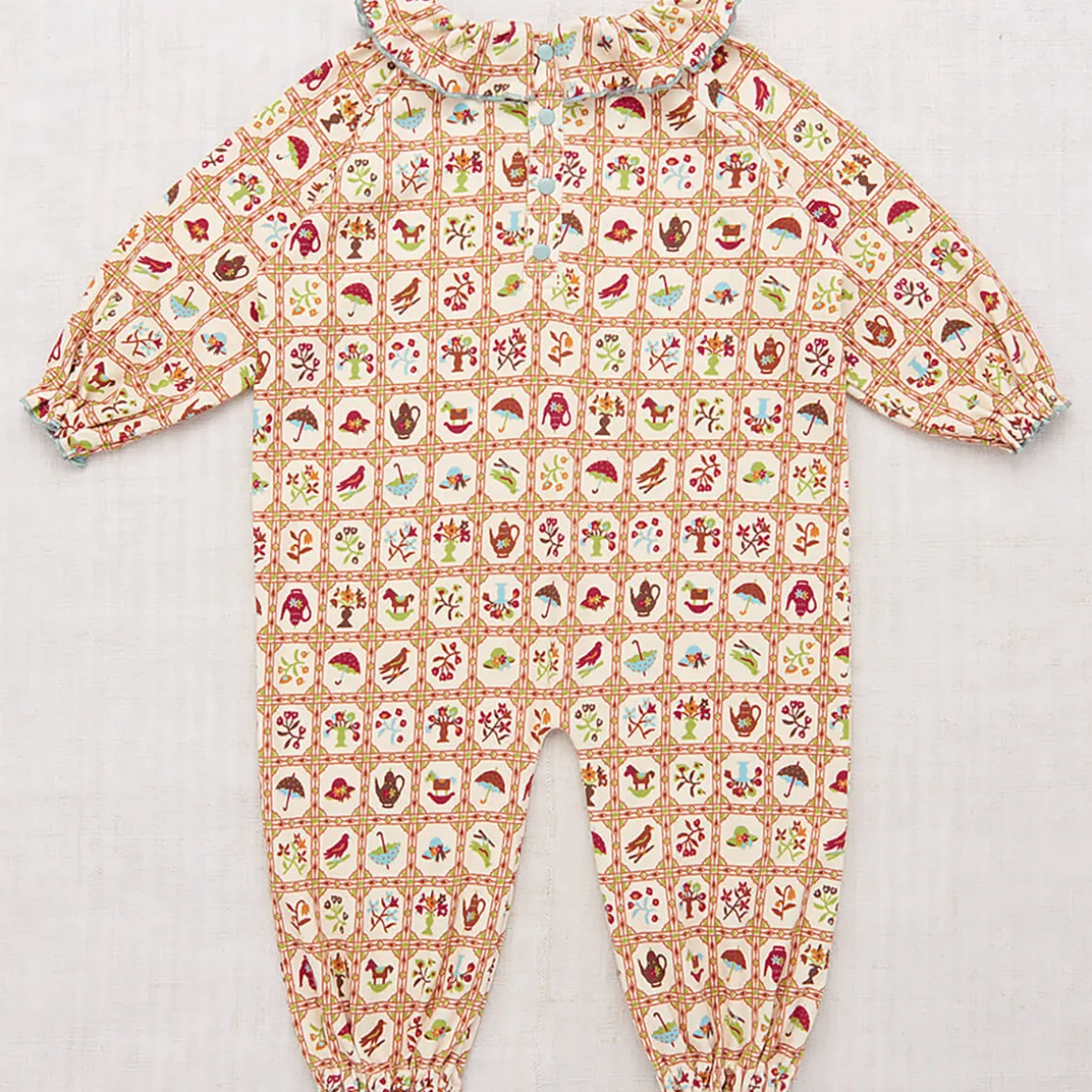 Pierrot Onesie in String Trellis by Misha & Puff