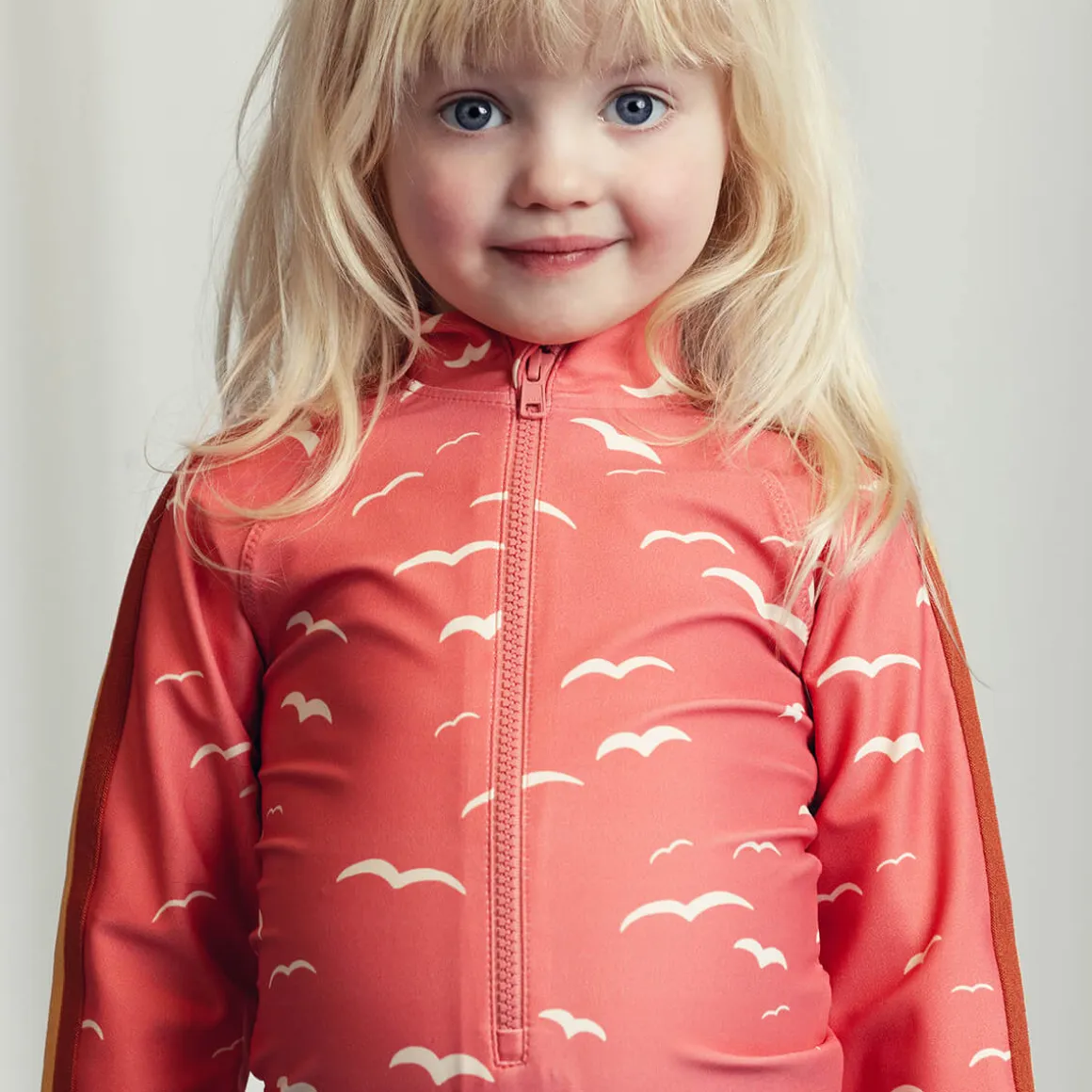 Seagull AOP Long Sleeved Swimsuit in Pink by Mini Rodini
