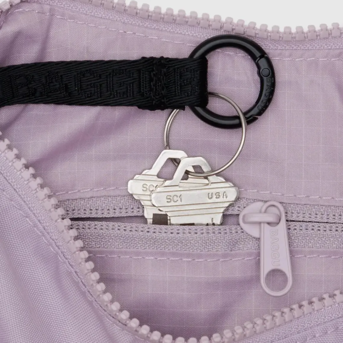 Small Nylon Crescent Bag in Dusty Pink by Baggu