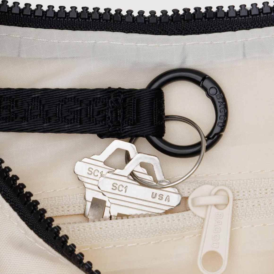 Small Nylon Crescent Bag in Embroidered Shells by Baggu