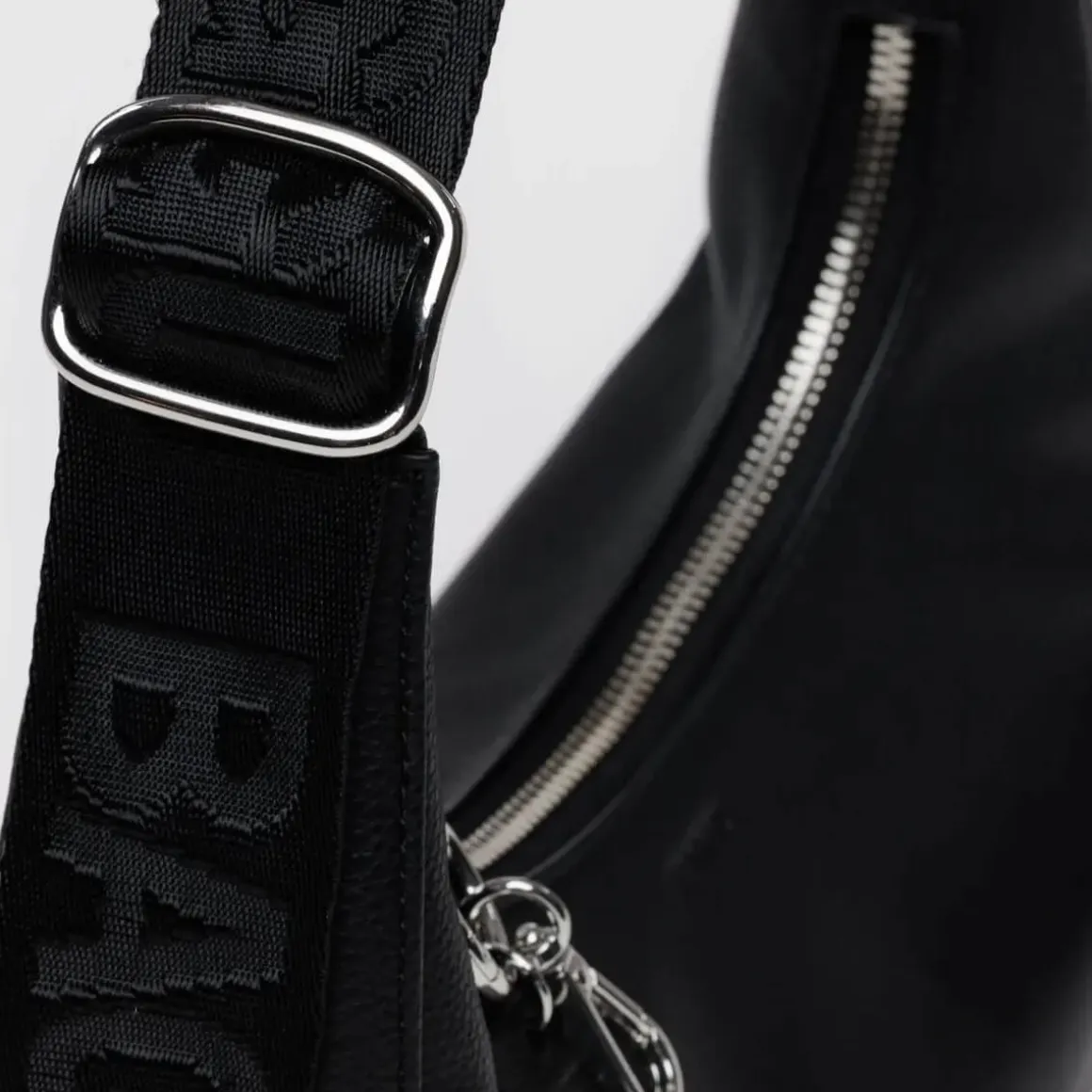 Small Recycled Leather Crescent Bag in Black by Baggu