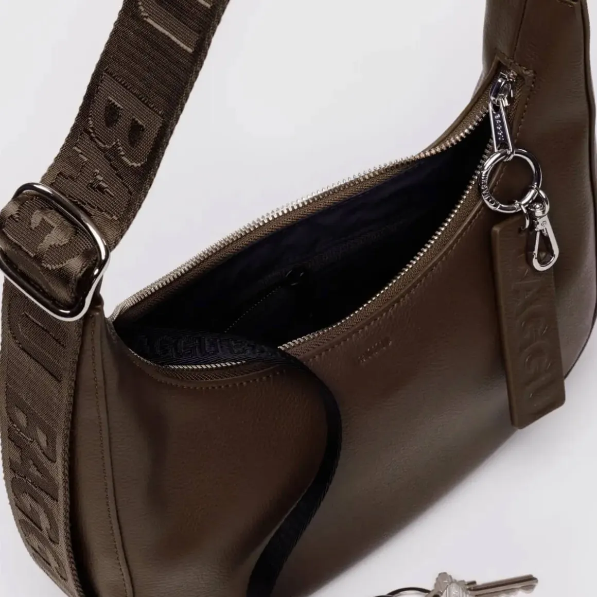 Small Recycled Leather Crescent Bag in Brown by Baggu