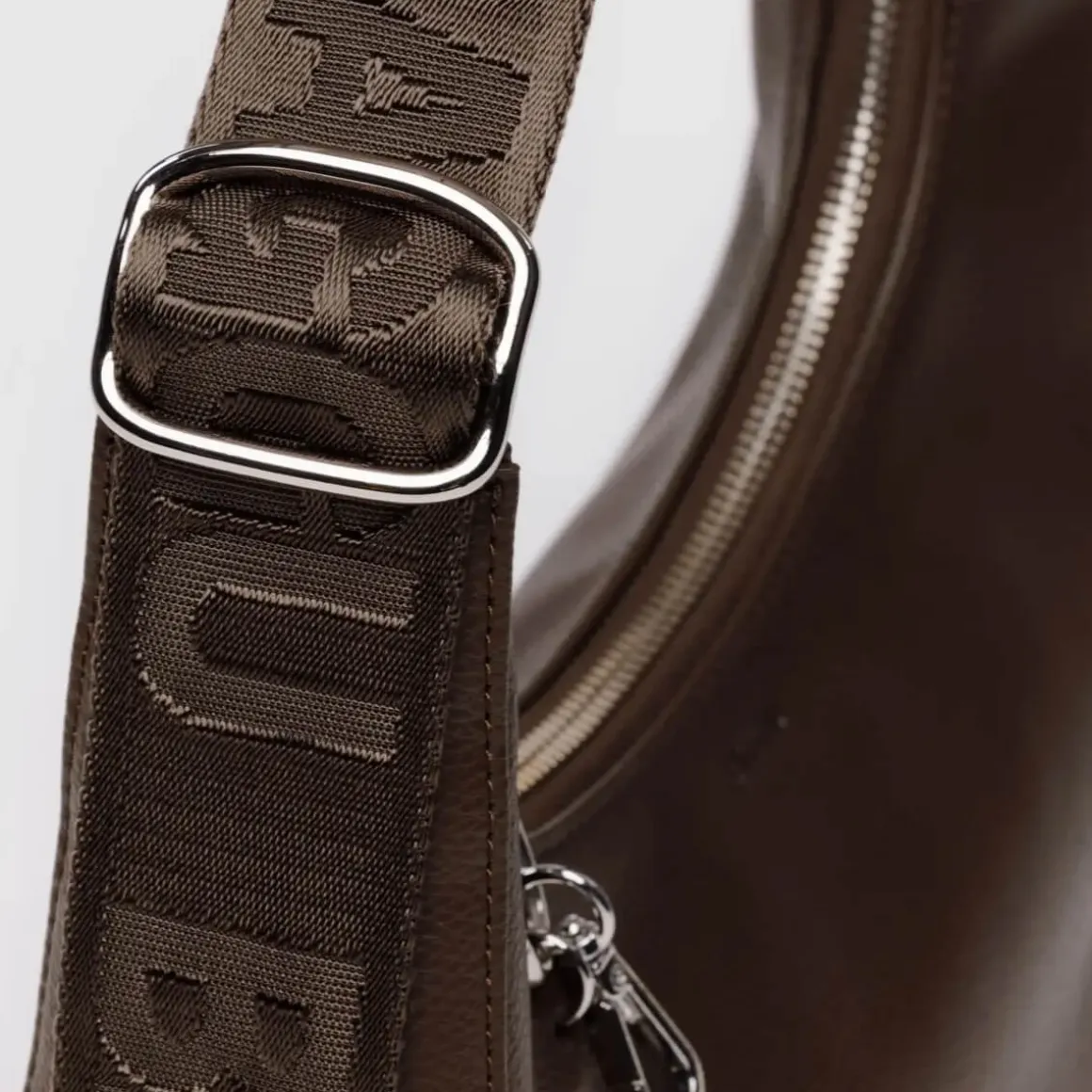 Small Recycled Leather Crescent Bag in Brown by Baggu