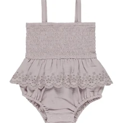Smocked Skirted Romper in Lavender by Quincy Mae