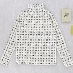 Snap Turtleneck in Cream Folk Quilt by Iver & Isla