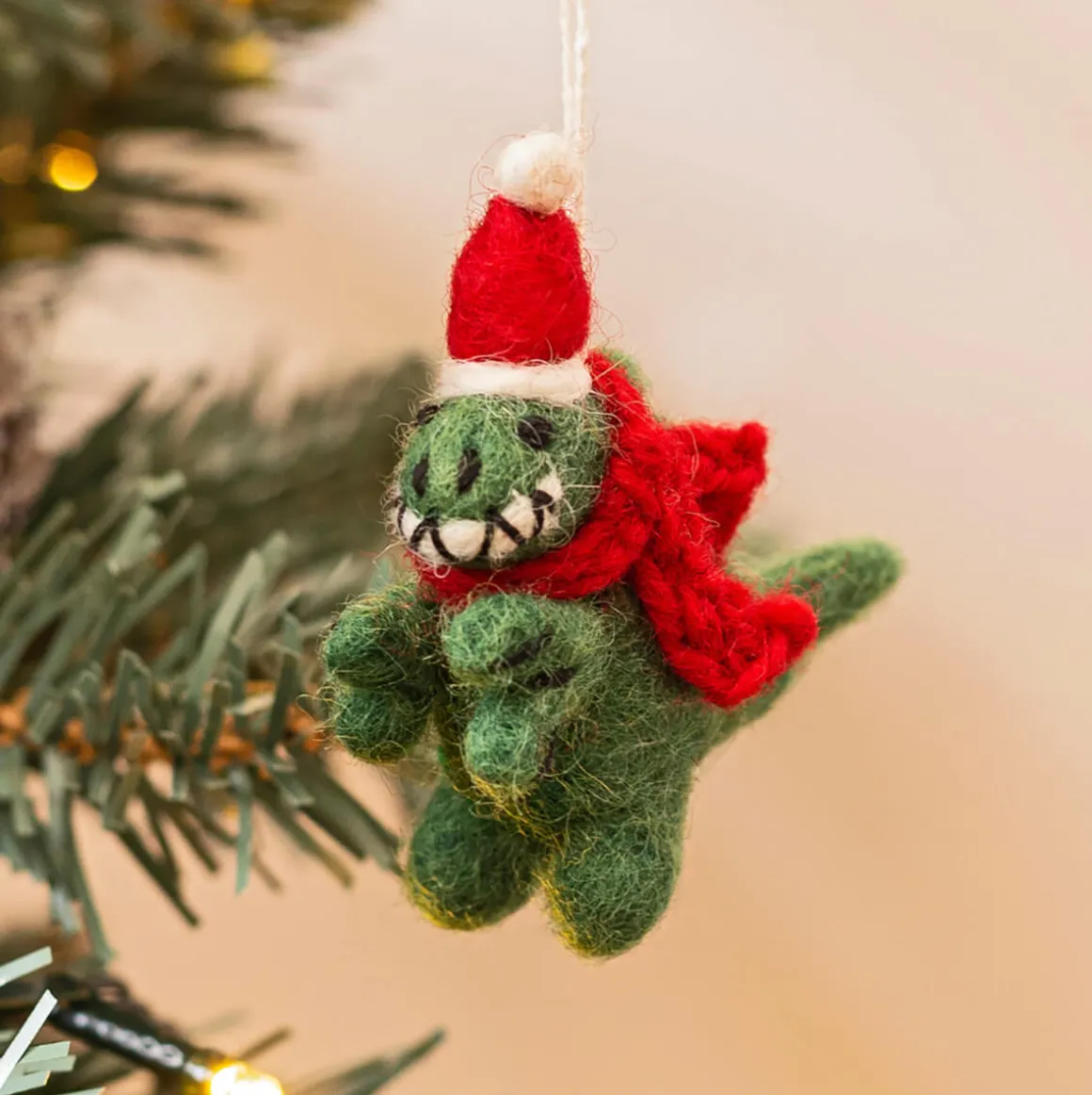 T Rex With Present Hanging Christmas Decoration by Amica