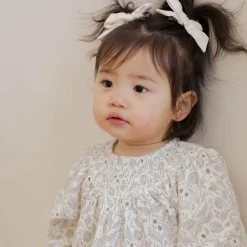 V Smocked Dress in Winter Floral by Quincy Mae